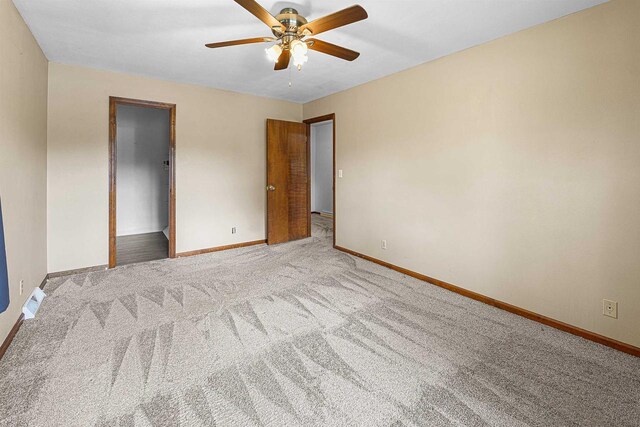 241 Bayberry Ln, Fond Du Lac, WI 54935 - unfurnished bedroom with carpet flooring and a ceiling fan