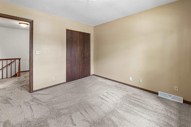 241 Bayberry Ln, Fond Du Lac, WI 54935 - unfurnished bedroom featuring carpet and a closet
