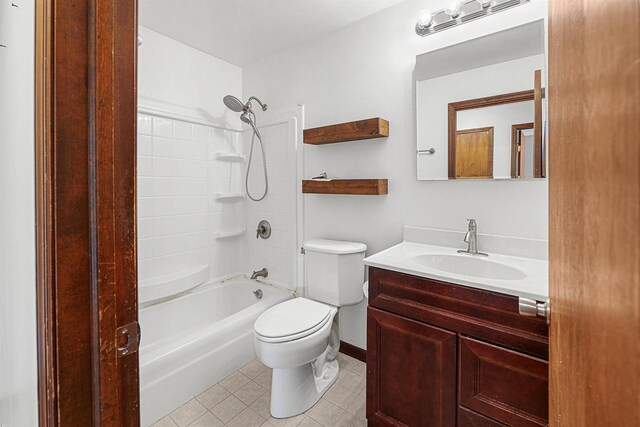 241 Bayberry Ln, Fond Du Lac, WI 54935 - full bath with vanity,  shower combination, and tile patterned floors
