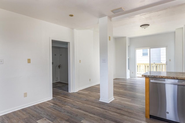 524 W New York Ave, Oshkosh, WI 54901 - unfurnished living room featuring dark wood finished floors and baseboards