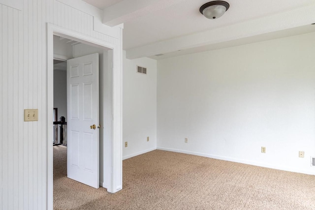 524 W New York Ave, Oshkosh, WI 54901 - empty room with light colored carpet and beam ceiling