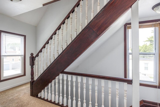 524 W New York Ave, Oshkosh, WI 54901 - stairs featuring carpet floors and lofted ceiling