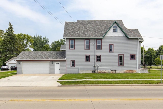 524 W New York Ave, Oshkosh, WI 54901 - view of front of property featuring an attached garage, a front yard, driveway, and a shingled roof