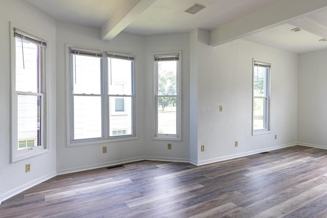 524 W New York Ave, Oshkosh, WI 54901 - empty room with beam ceiling and dark wood-style floors