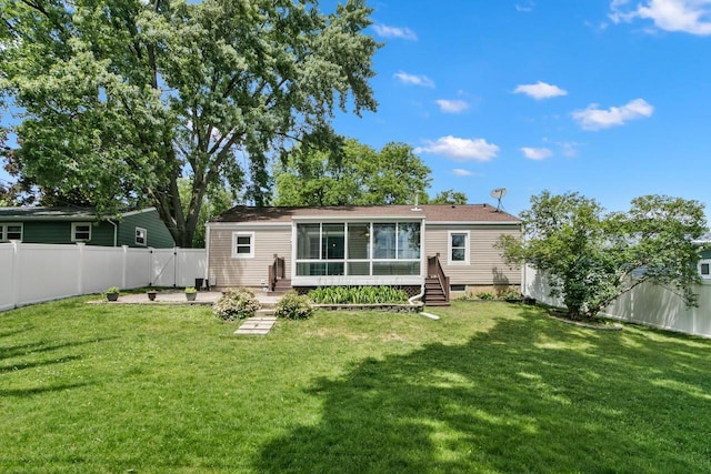 204 Panther Trl, Monona, WI 53716 - back of house with a fenced backyard and a sunroom