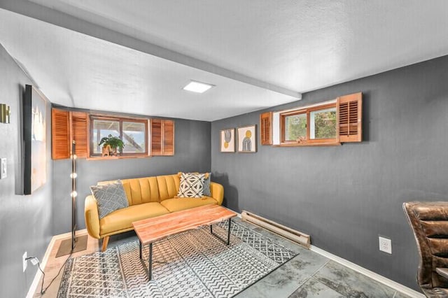 456 W Wisconsin Ave, Pewaukee, WI 53072 - living area with a baseboard heating unit and baseboards