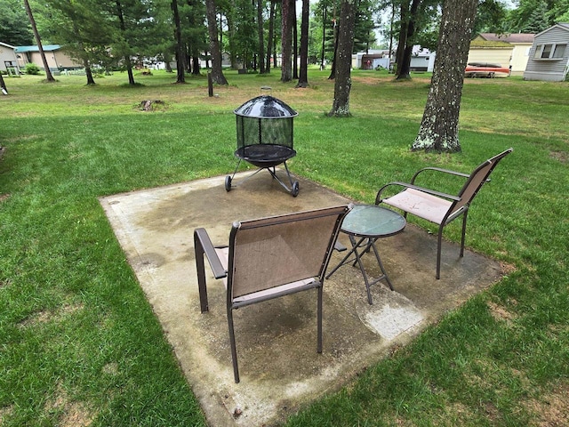 N11445 County Road A, Tomahawk, WI 54487 - view of patio with an outdoor fire pit