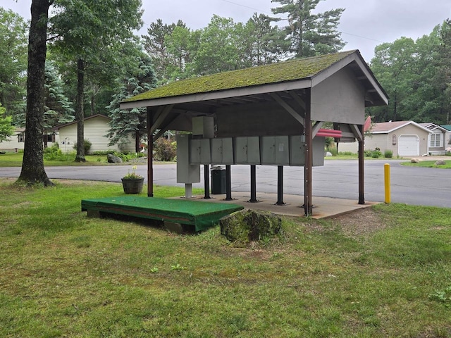 N11445 County Road A, Tomahawk, WI 54487 - view of home's community featuring mail area and a lawn