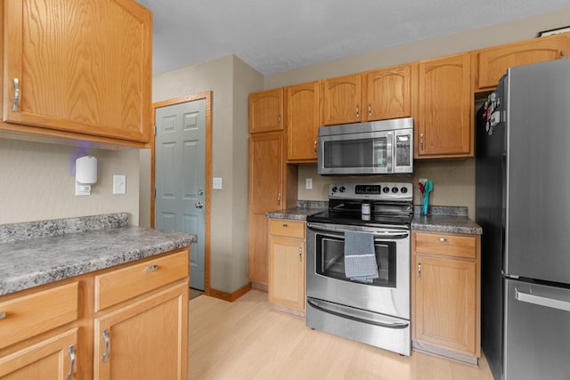 362 Dakota Lee Way, Omro, WI 54963 - kitchen featuring appliances with stainless steel finishes and light wood-style flooring