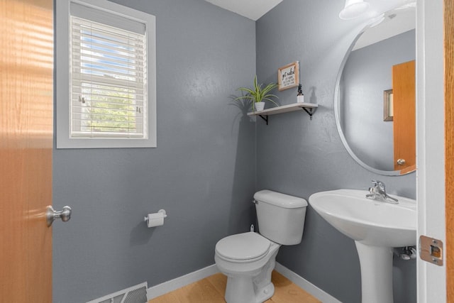 362 Dakota Lee Way, Omro, WI 54963 - half bathroom with toilet and baseboards