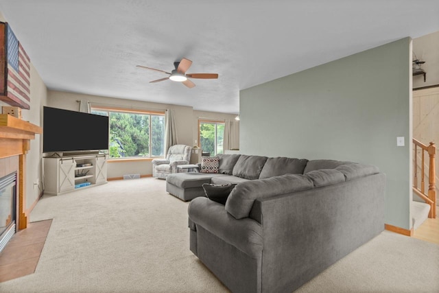 362 Dakota Lee Way, Omro, WI 54963 - carpeted living area with a ceiling fan and a tile fireplace