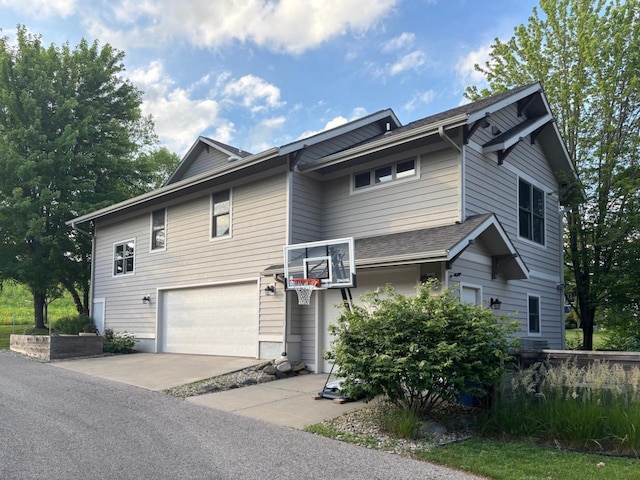 6833 Phil Lewis Way, Middleton, WI 53562 - view of front of home featuring a garage and concrete driveway