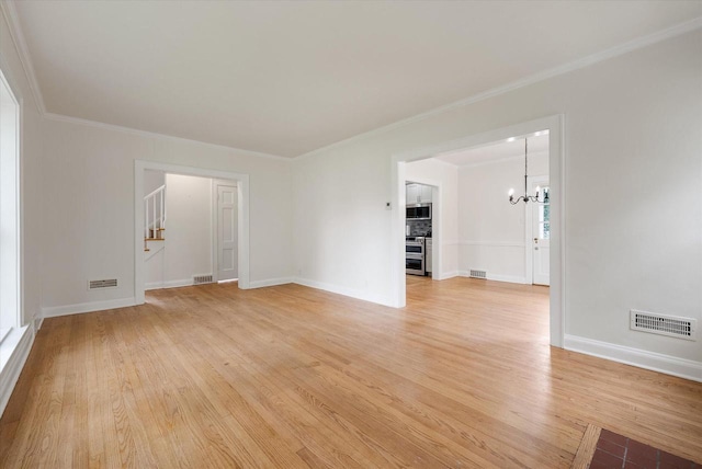 5825 N Bay Ridge Ave, Whitefish Bay, WI 53217 - unfurnished room with a chandelier, light wood-type flooring, and crown molding