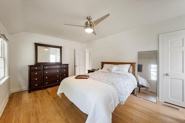 5825 N Bay Ridge Ave, Whitefish Bay, WI 53217 - bedroom with light wood-style floors, multiple windows, and ceiling fan