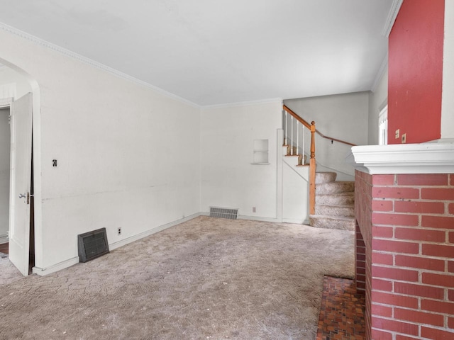 4134 N 46th St, Milwaukee, WI 53216 - unfurnished living room featuring carpet floors, stairway, arched walkways, and ornamental molding