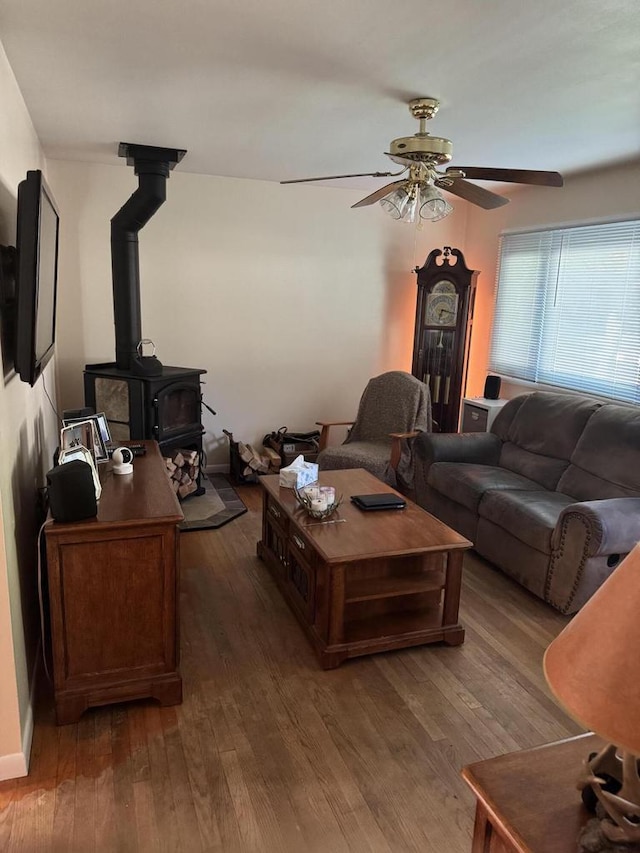 408 N Hine Ave, Waukesha, WI 53188 - living room with a ceiling fan, wood finished floors, and a wood stove