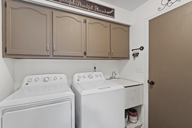 S52W23066 Hunters Holw, Waukesha, WI 53189 - laundry area with washing machine and dryer and cabinet space