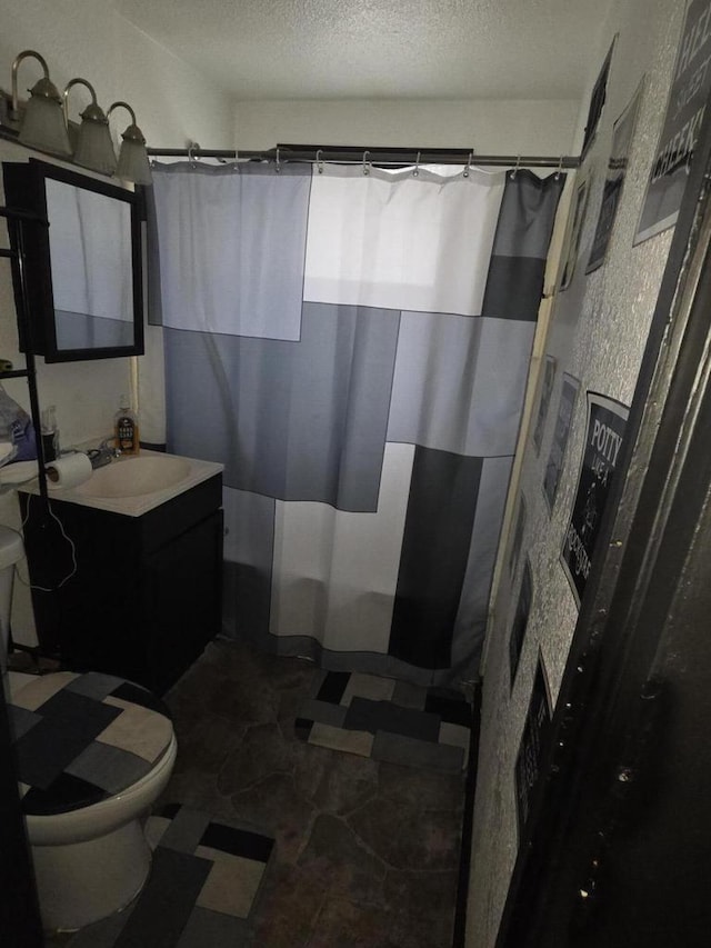 3223 N 36th St, Milwaukee, WI 53216 - bathroom with vanity, curtained shower, and a textured ceiling