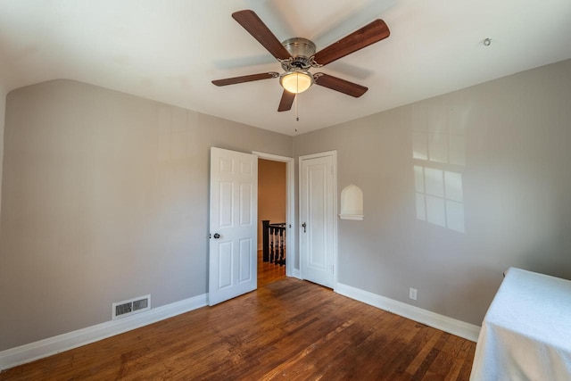 7550 26th Ave, Kenosha, WI 53143 - unfurnished bedroom featuring wood finished floors, ceiling fan, and vaulted ceiling