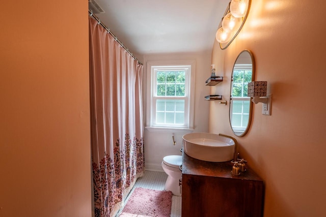 7550 26th Ave, Kenosha, WI 53143 - bathroom with vanity and a shower with shower curtain