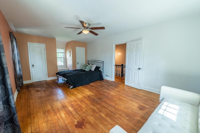7550 26th Ave, Kenosha, WI 53143 - bedroom with light wood finished floors and ceiling fan