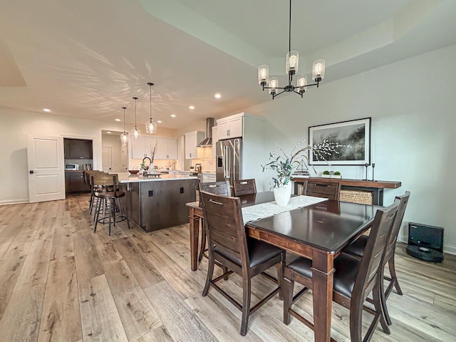 1601 Sauk Trl, Waukesha, WI 53189 - dining area with a chandelier, light wood finished floors, and recessed lighting