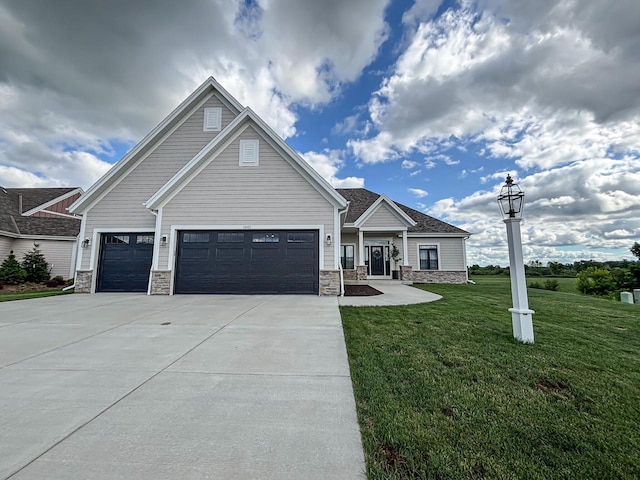 1601 Sauk Trl, Waukesha, WI 53189 - craftsman-style house with stone siding, concrete driveway, a front lawn, and a garage