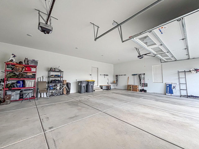1601 Sauk Trl, Waukesha, WI 53189 - garage featuring a garage door opener