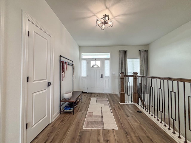 1601 Sauk Trl, Waukesha, WI 53189 - foyer entrance featuring wood finished floors and baseboards