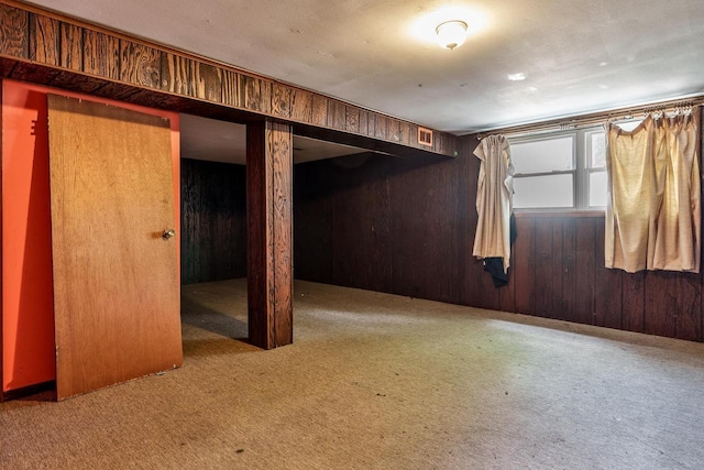 2043 Linway Dr, Beloit, WI 53511 - unfurnished bedroom with carpet floors and wood walls