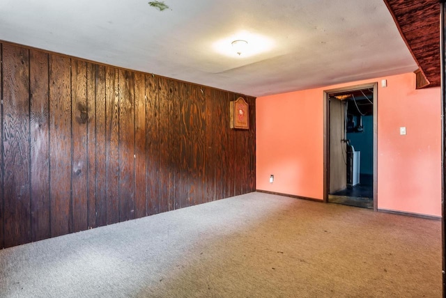 2043 Linway Dr, Beloit, WI 53511 - carpeted spare room featuring wooden walls and baseboards