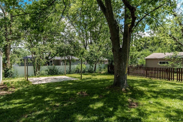 2043 Linway Dr, Beloit, WI 53511 - fenced backyard with a patio area