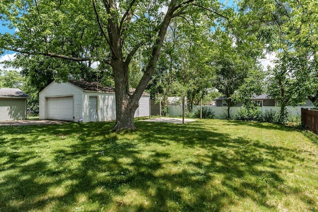 2043 Linway Dr, Beloit, WI 53511 - view of yard featuring an outdoor structure and a garage