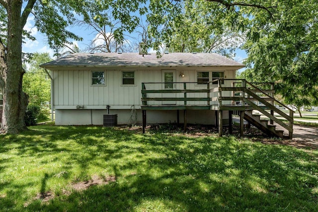2043 Linway Dr, Beloit, WI 53511 - rear view of property with a wooden deck, a yard, stairs, and a shingled roof