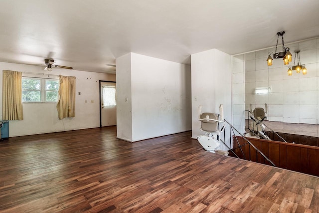 2043 Linway Dr, Beloit, WI 53511 - living area featuring wood finished floors, a chandelier, and a ceiling fan