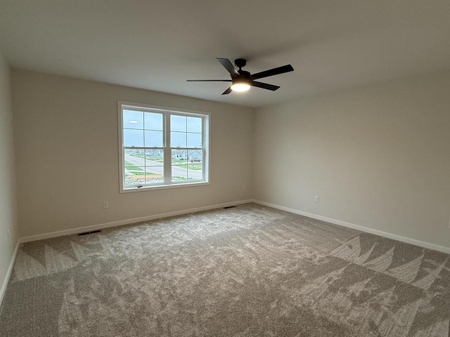 3150 Bartells Dr, Beloit, WI 53511 - empty room featuring carpet and a ceiling fan