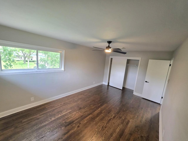 4643 N 108th St, Wauwatosa, WI 53225 - unfurnished bedroom with dark wood-style flooring, a closet, and ceiling fan