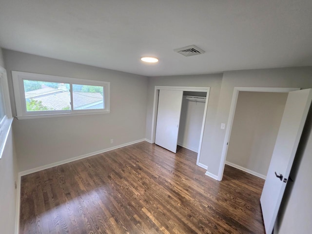 4643 N 108th St, Wauwatosa, WI 53225 - unfurnished bedroom featuring dark wood-type flooring and a closet