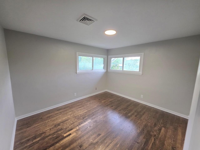 4643 N 108th St, Wauwatosa, WI 53225 - unfurnished room with dark wood-style flooring and baseboards