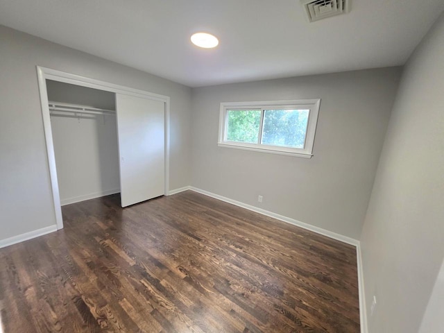 4643 N 108th St, Wauwatosa, WI 53225 - unfurnished bedroom featuring dark wood finished floors and a closet