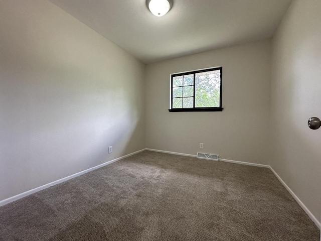 5145 Admiralty Ave Unit 5147, Racine, WI 53406 - carpeted spare room featuring baseboards