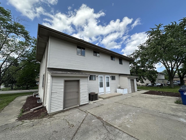 5145 Admiralty Ave Unit 5147, Racine, WI 53406 - rear view of house featuring a patio