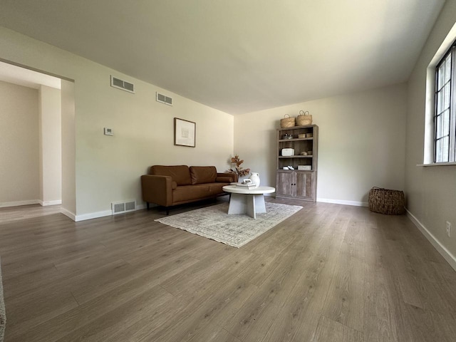 5145 Admiralty Ave Unit 5147, Racine, WI 53406 - living area featuring dark wood finished floors and baseboards