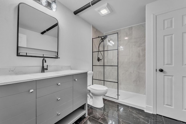 7314 25th Ave, Kenosha, WI 53143 - bathroom with vanity, tiled shower, and marble finish floors