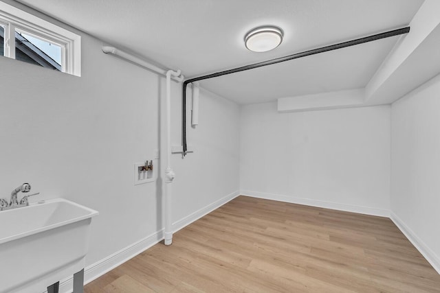 7314 25th Ave, Kenosha, WI 53143 - basement featuring light wood-style floors and baseboards