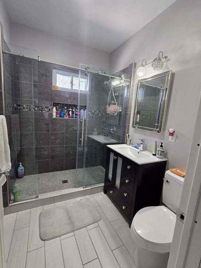 1635 Grand Ave, Racine, WI 53403 - full bath featuring vanity, a shower stall, and tile patterned floors