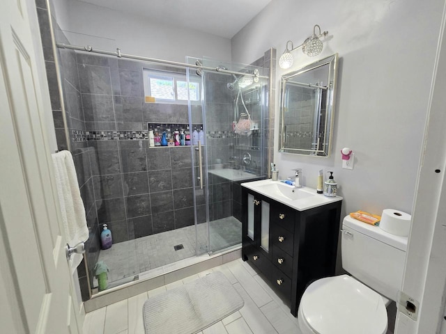 1635 Grand Ave, Racine, WI 53403 - bathroom featuring vanity, a shower stall, and tile patterned flooring