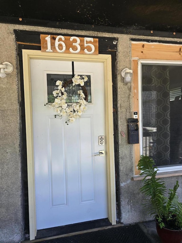1635 Grand Ave, Racine, WI 53403 - property entrance featuring stucco siding