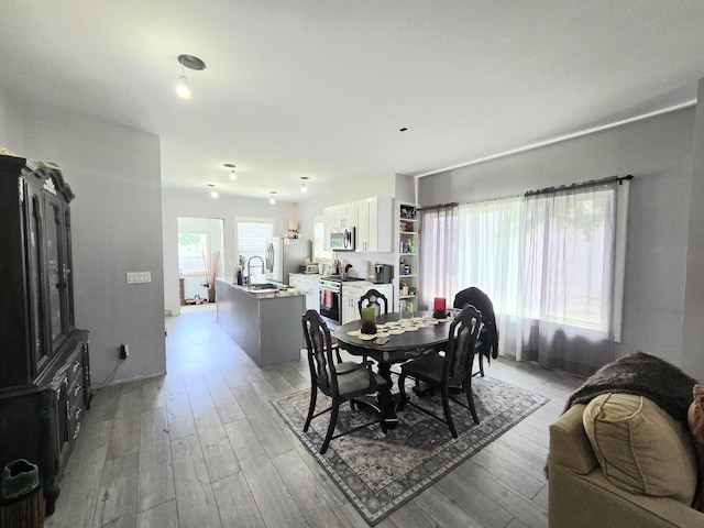 1635 Grand Ave, Racine, WI 53403 - dining space featuring light wood finished floors