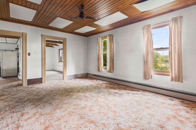 5046 State Highway 33, West Bend, WI 53095 - empty room with baseboard heating and carpet floors